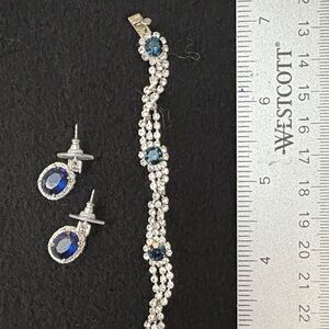 7” bracelet/pierced earrings accompanies Navy-colored outfits.